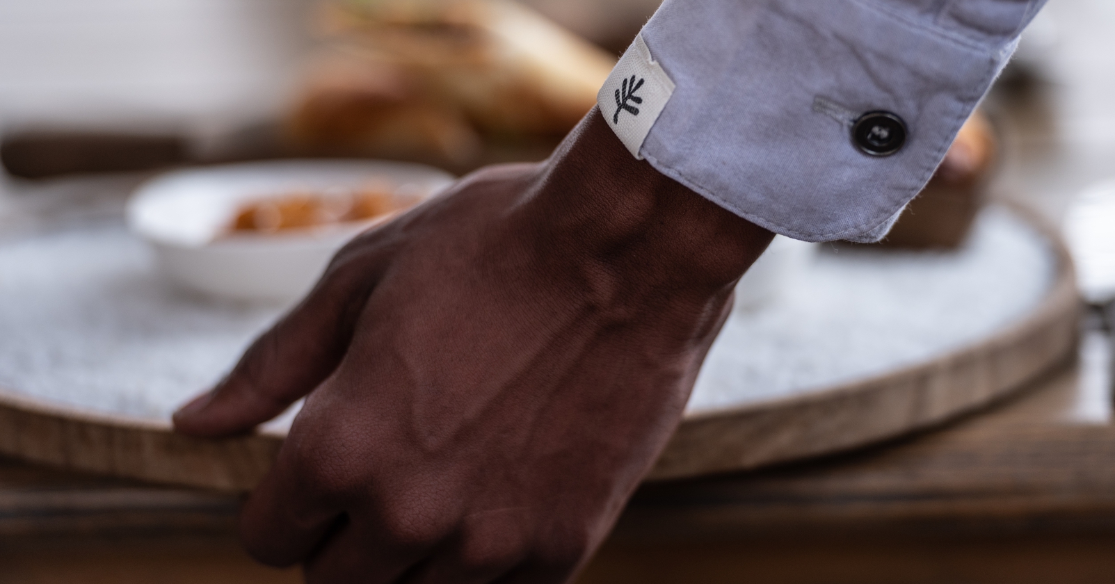 Waiter delivering food at The Motse restaurant